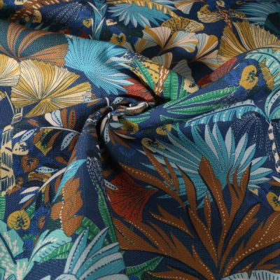 Tissu Toile aspect Canvas déperlant Magelan fleuris sur fond Bleu - Par 10 cm