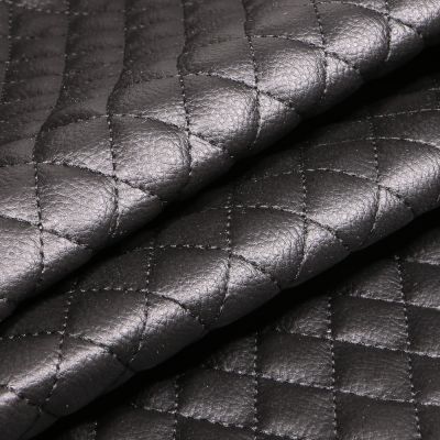 Tissu Simili cuir matelassé uni Chelsy Noir - Par 10 cm