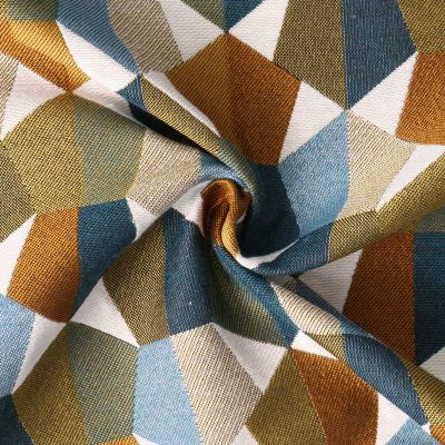 Tissu Jacquard  Mustang motif géométrique Bleu sur fond Vert kaki - Par 10 cm