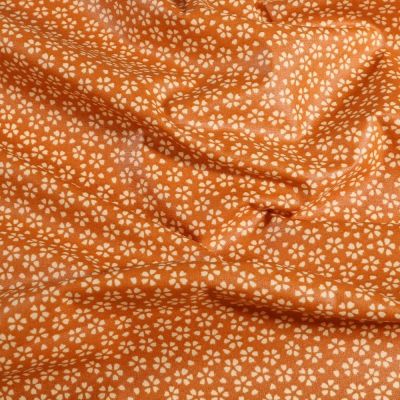 Tissu Coton enduit Myosotis sur fond Orange - Par 10 cm