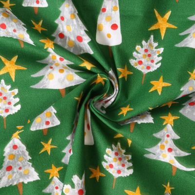 Tissu Popeline de Coton  Solveig sapins Blancs sur fond Vert - Par 10 cm