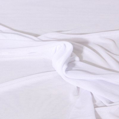 Tissu Tulle  extensible ultra-doux uni Blanc - Par 10 cm