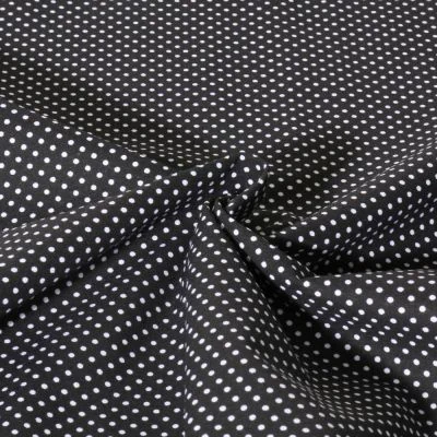 Tissu Popeline de Coton  Carmella à pois blanc sur fond Noir - Par 10 cm