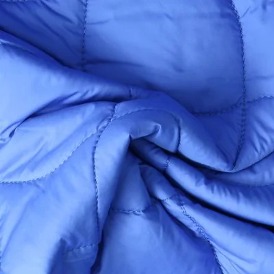 Tissu Doudoune matelassé Nils uni Bleu roi envers Vert anis - Par 10 cm
