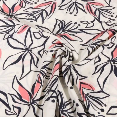 Tissu Stretch imprimé Motifs floraux noir et rose sur fond Blanc - Par 10 cm