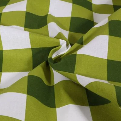 Tissu Coton enduit à carreaux verts sur fond Blanc - Par 10 cm