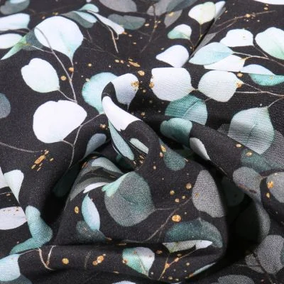Tissu Viscose Aqua Eucalyptus sur fond Noir - Par 10 cm
