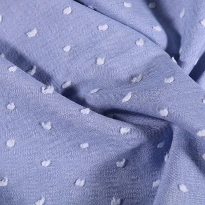 Tissu Plumetis léger  Pois blanc sur fond Bleu - Par 10 cm