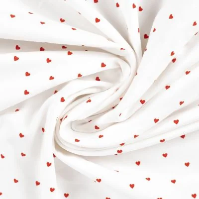 Tissu Jersey Coton Rosalie Petits coeurs framboise sur fond Blanc cassé - Par 10 cm