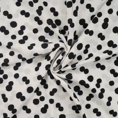 Tissu Viscose Chally Pois noirs sur fond Blanc - Par 10 cm