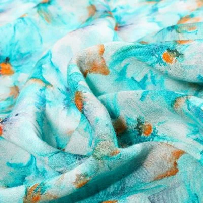 Tissu Viscose Jan Sigrid sur fond Bleu - Par 10 cm