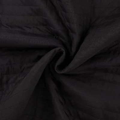 Tissu Coupe-Vent Matelassé uni Noir - Par 10 cm