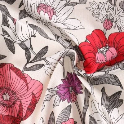 Tissu Coton  Cretonne Ysoline fleurs Rouges sur fond Ivoire - Par 10 cm