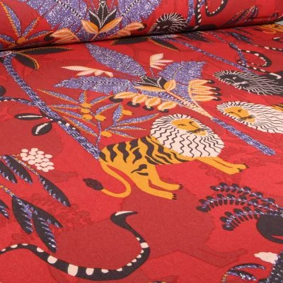 Tissu Toile de Coton Simba sur fond Terre de Sienne - Par 10 cm