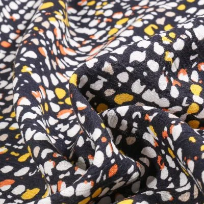 Tissu Crépon de viscose Sylia sur fond Bleu marine - Par 10 cm