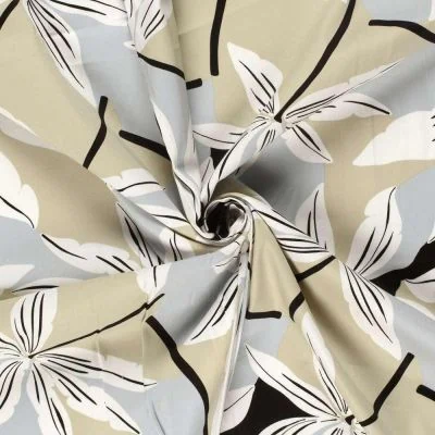 Tissu Coton satiné extensible Florisca sur fond Beige - Par 10 cm