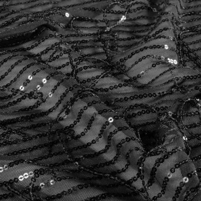 Tissu Mousseline Sequins Ondea extensible motifs franges Noirs sur fond Noir - Par 10 cm
