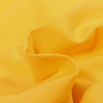 Tissu Coton uni Jaune curcuma - Par 10 cm