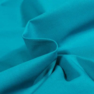 Tissu Coton uni Bleu hawaï - Par 10 cm