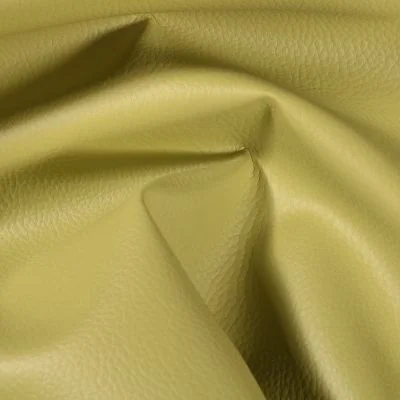Simili cuir d&#039;ameublement uni Vert fenouil - Par 50 cm