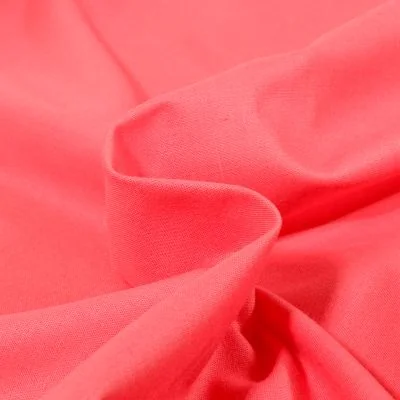 Tissu Coton uni Corail - Par 10 cm